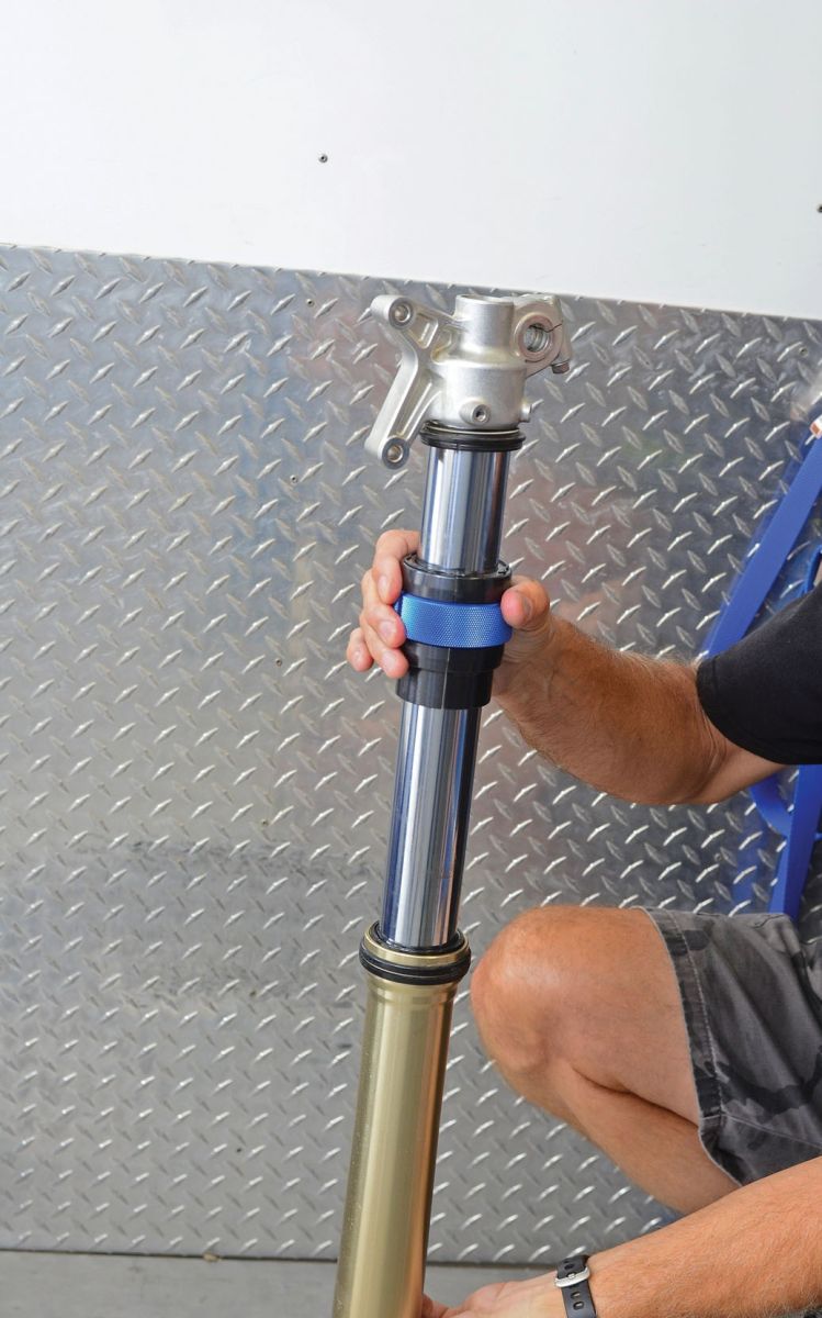 Using a split fork seal driver to seat a new motorcycle fork oil seal