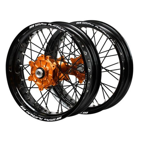 KTM SM Pro Cush Drive Orange Hubs / SM Pro Platinum Black Rims Supermotard / Black Spokes Orange Nipples Wheel Set 17/17